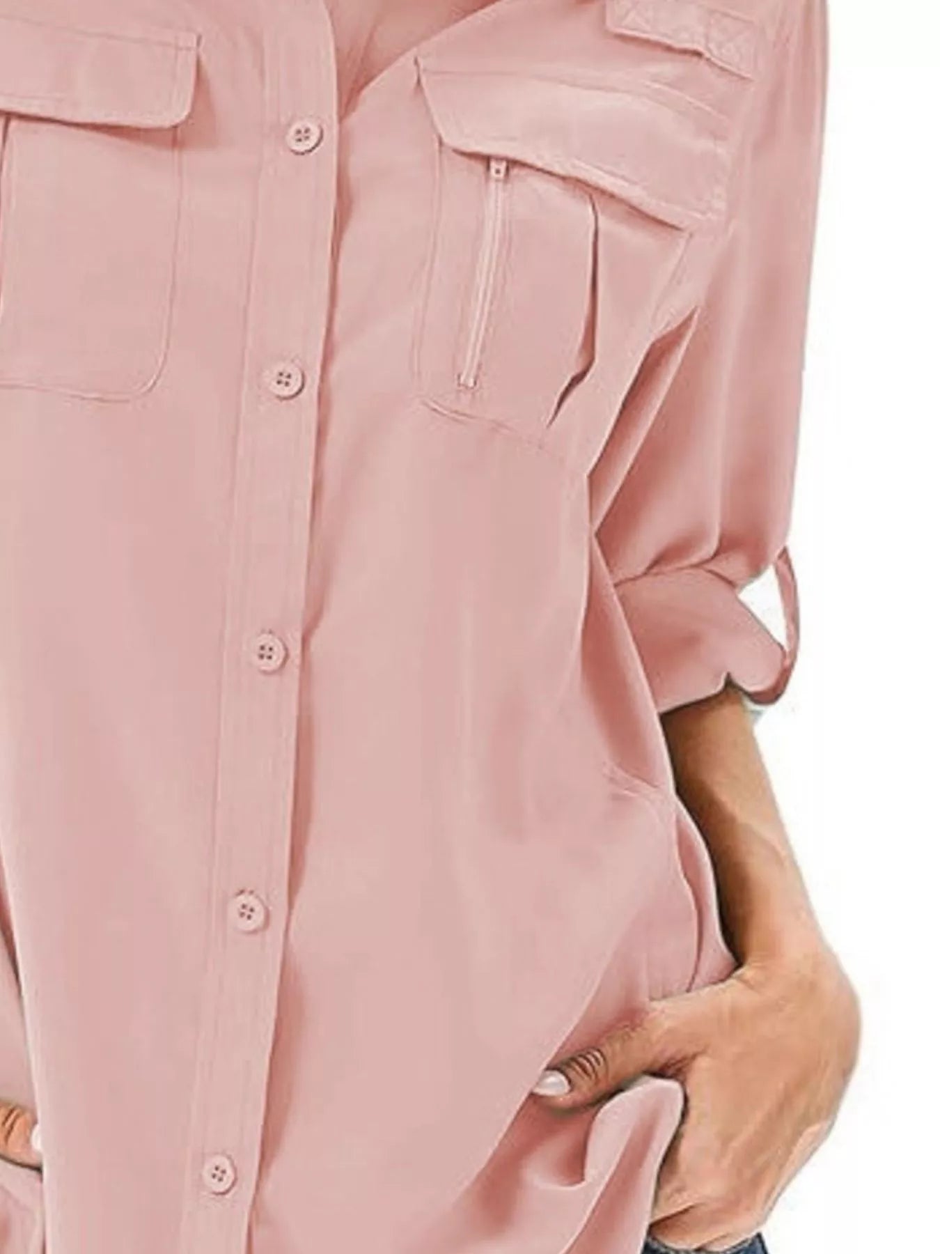 Pink roll-up sleeve button-up shirt with chest pockets and zipper detail.