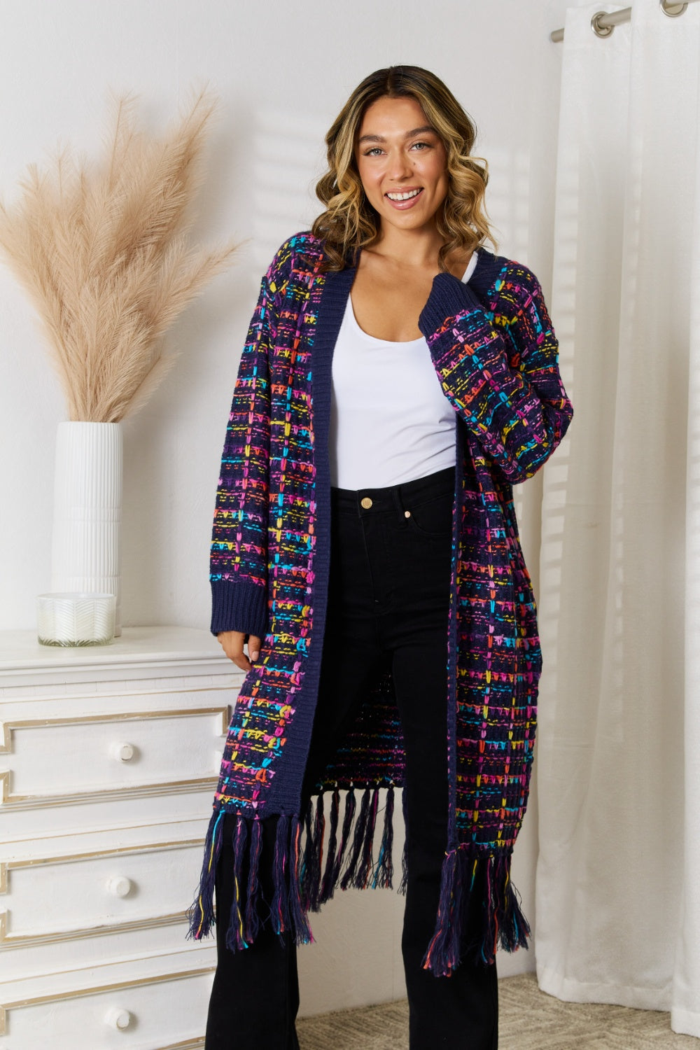 Multicolor bouclé maxi cardigan with fringe detail and long sleeves.