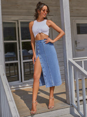 Button-front denim midi skirt in Sky Blue with a high slit and button closure.