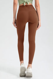 Caramel high rise leggings with V-seam detail and full length legs.