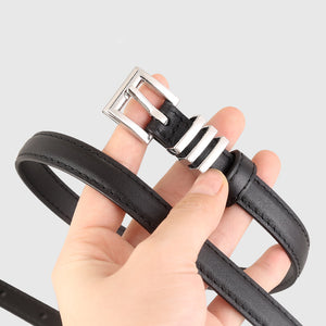 Black cowhide leather belt with silver buckle and decorative detail