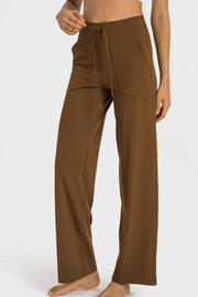 Brown wide-leg lounge joggers with drawstring and utility pockets