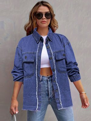 Frayed edge denim overshirt in medium blue cotton with button front and chest pockets.