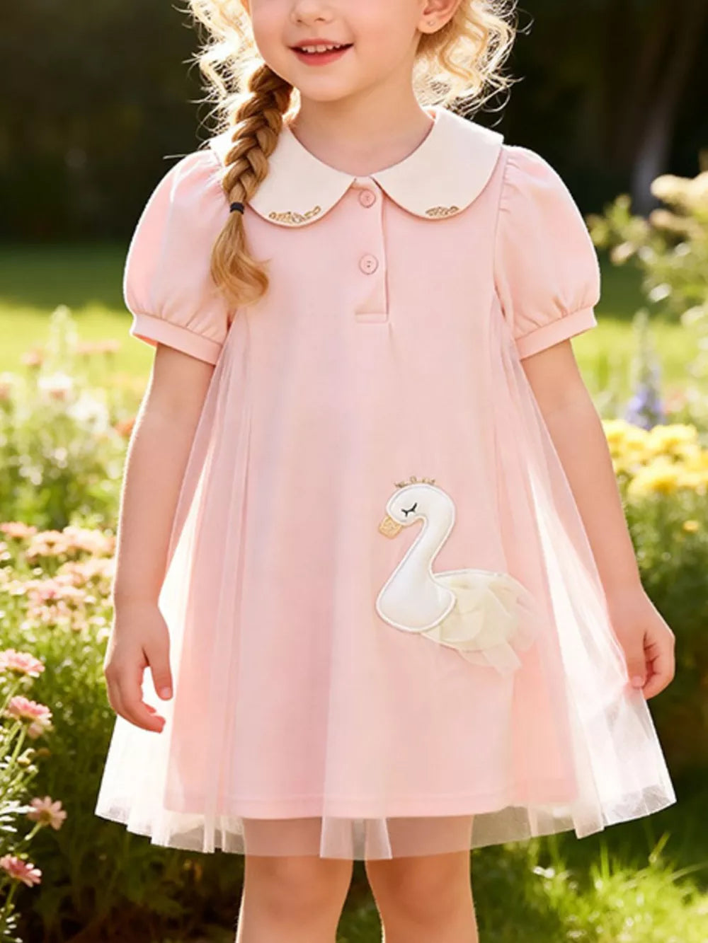 Charming blush pink cotton baby dress with Peter Pan collar and swan applique