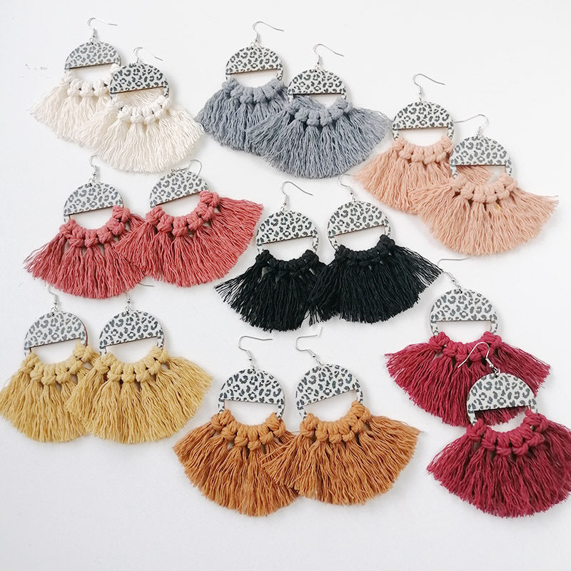 Leopard print tassel earrings in multiple colors, featuring a semi-circle top and fringe detail.