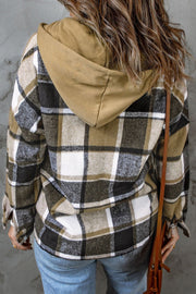 Plaid hooded shacket in tan, black, and white. Relaxed fit, casual outerwear.