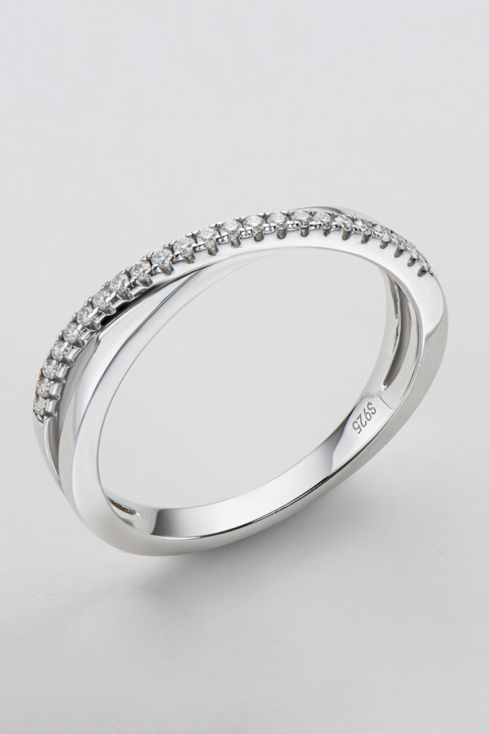 Sterling silver crossover band ring with pavé moissanite accents