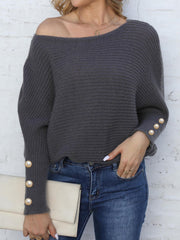 Dark Gray batwing knit sweater with pearl cuff details and boat neckline.