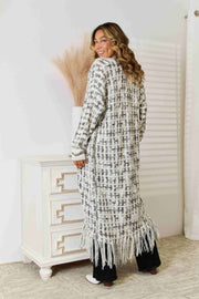 Black/White crochet maxi cardigan with fringe detail and plaid pattern.