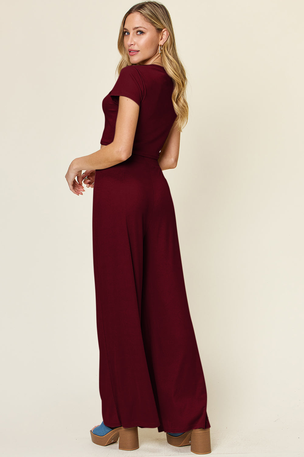 Burgundy cropped tee and wide-leg palazzo pants set with short sleeves.