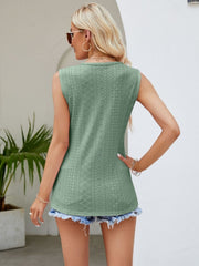 Scalloped eyelet tank top in light green with center lace detail and diamond pattern.
