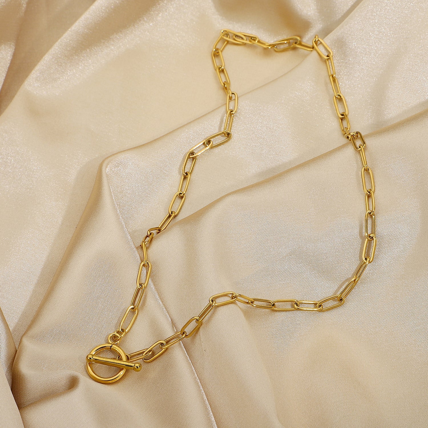 Gold-tone paperclip chain necklace with toggle clasp