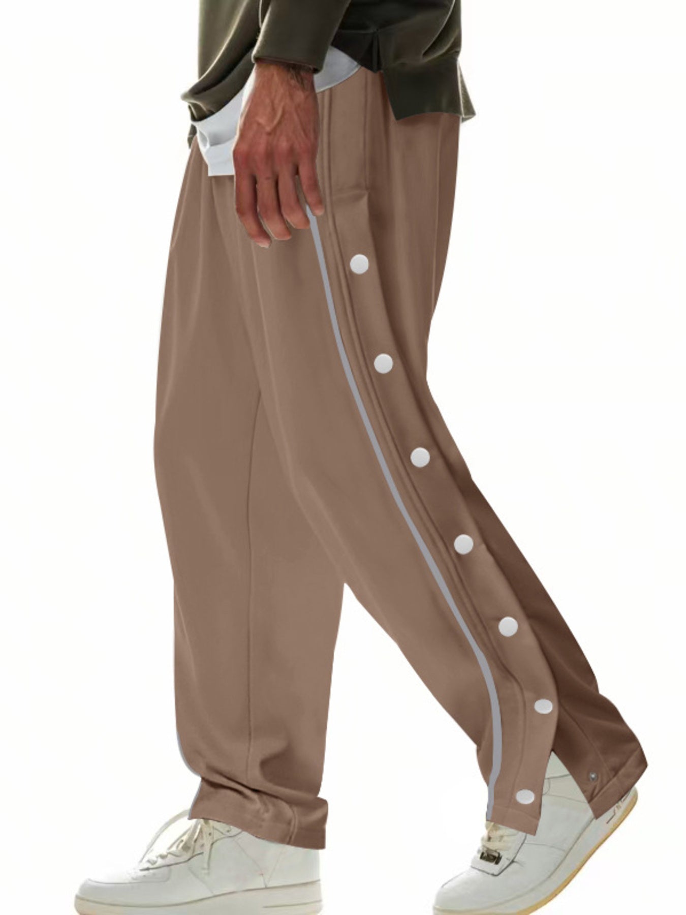 Men's khaki track pants with snap buttons down the side and reflective stripe detail.