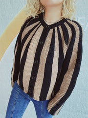 Bold stripe knit cardigan in tan and black with button front and crew neck.
