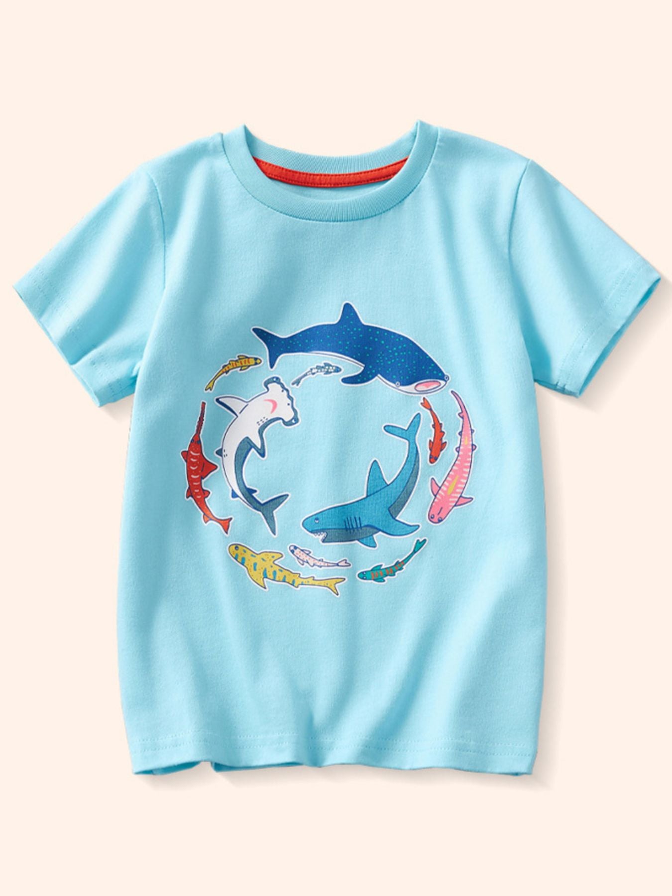 Pastel blue cotton crew neck t-shirt with playful shark and fish print