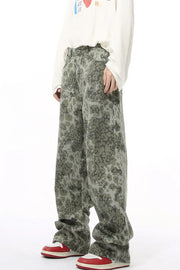 Camouflage wide-leg denim trousers in Sage with a relaxed fit.