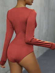 Long sleeve bodysuit in rust with gathered shoulder detail and a thong back.