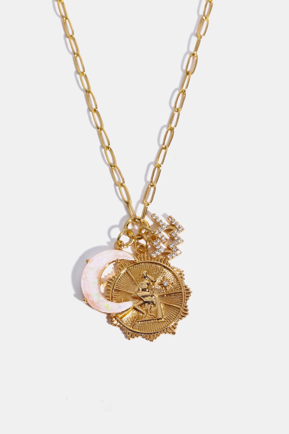 Gold celestial pendant necklace with zodiac coin, opal moon, and diamond accent charm.
