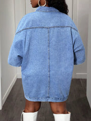Sky blue oversized denim batwing dress with buttoned collar and short sleeves.