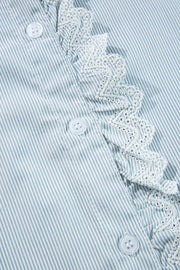 Pinstripe blouse with ruffled lace collar detail and white buttons.