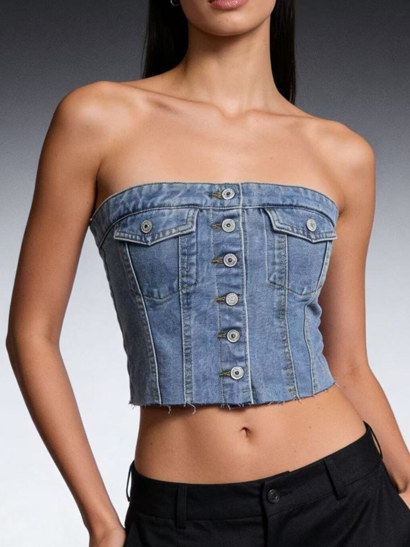 Cropped denim strapless top with button detailing and chest pockets