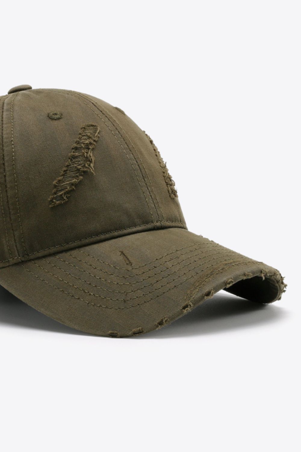 Army green distressed baseball cap with frayed details and adjustable fit.