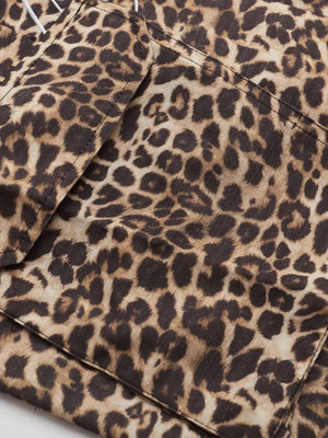 Men's leopard print cargo sweatpants with visible pocket details.