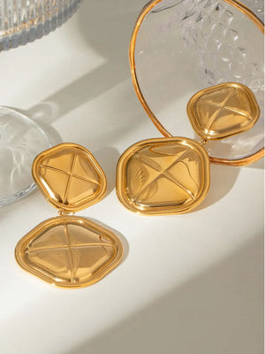 Sculpted gold drop earrings with geometric detail, 18K gold-plated.