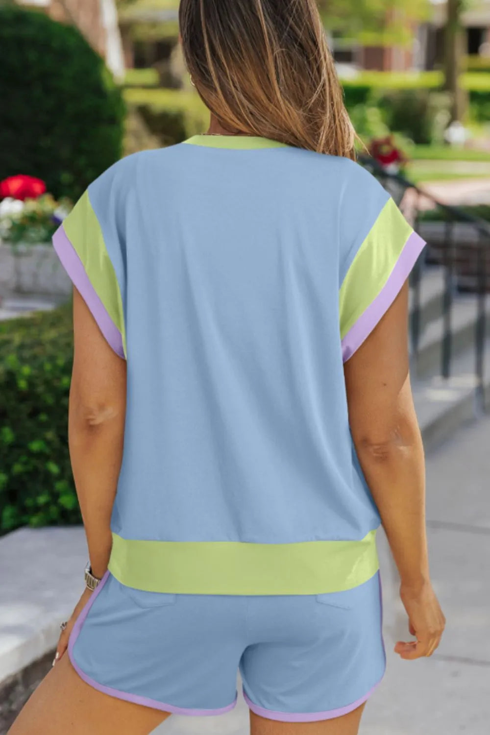 Light blue loungewear set with colorblock trim on sleeves and shorts.