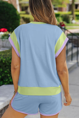 Light blue loungewear set with colorblock trim on sleeves and shorts.