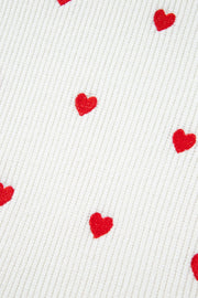 White ribbed crewneck sweater with allover red heart embroidery