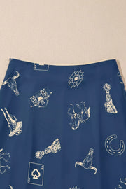 Blue satin maxi skirt with western print and draping.