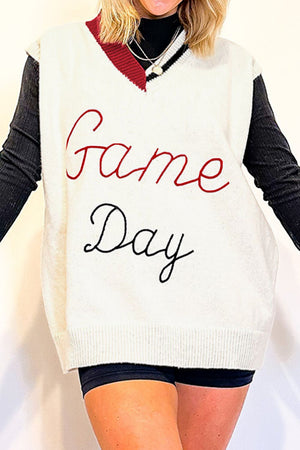 White knit vest with "Game Day" embroidery and burgundy trim neckline.