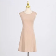 Beige sleeveless A-line mini dress with round neckline