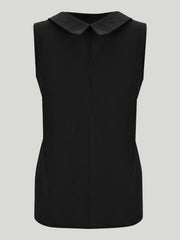 Black sleeveless Peter Pan collar blouse with textured fabric.