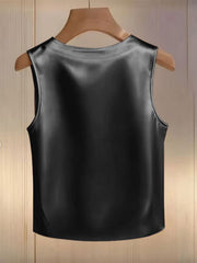 Black satin tank top with pearl embellishments, round neckline, sleeveless.