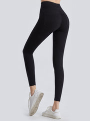 Black denim illusion sculpt leggings with back pockets and a high waist.