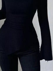 Black ribbed asymmetrical cowl neck top with flared sleeves