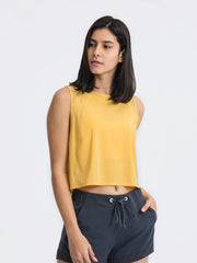 Pastel Yellow cropped active tank top with mesh inset back detail