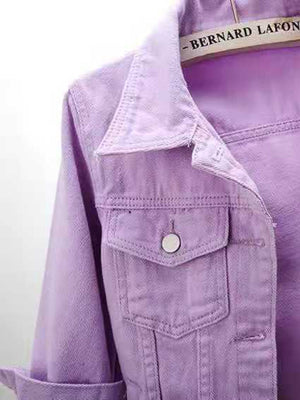 Lavender denim trucker jacket with button-flap chest pocket and collar detail.
