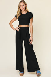 Black cropped tee and wide-leg palazzo pants set with pleats