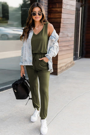 Moss green relaxed drawstring waist jumpsuit with V-neck and pockets