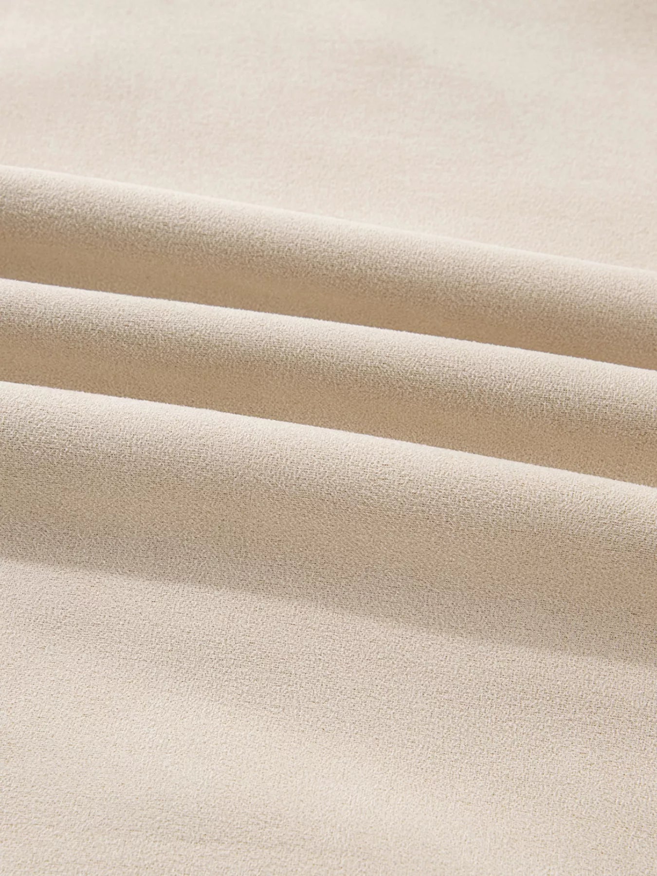 Lined Western loose jacket in eggshell, showing textured fabric detail.