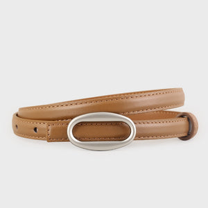 Sleek skinny belt in brown cowhide leather with oval silver buckle.