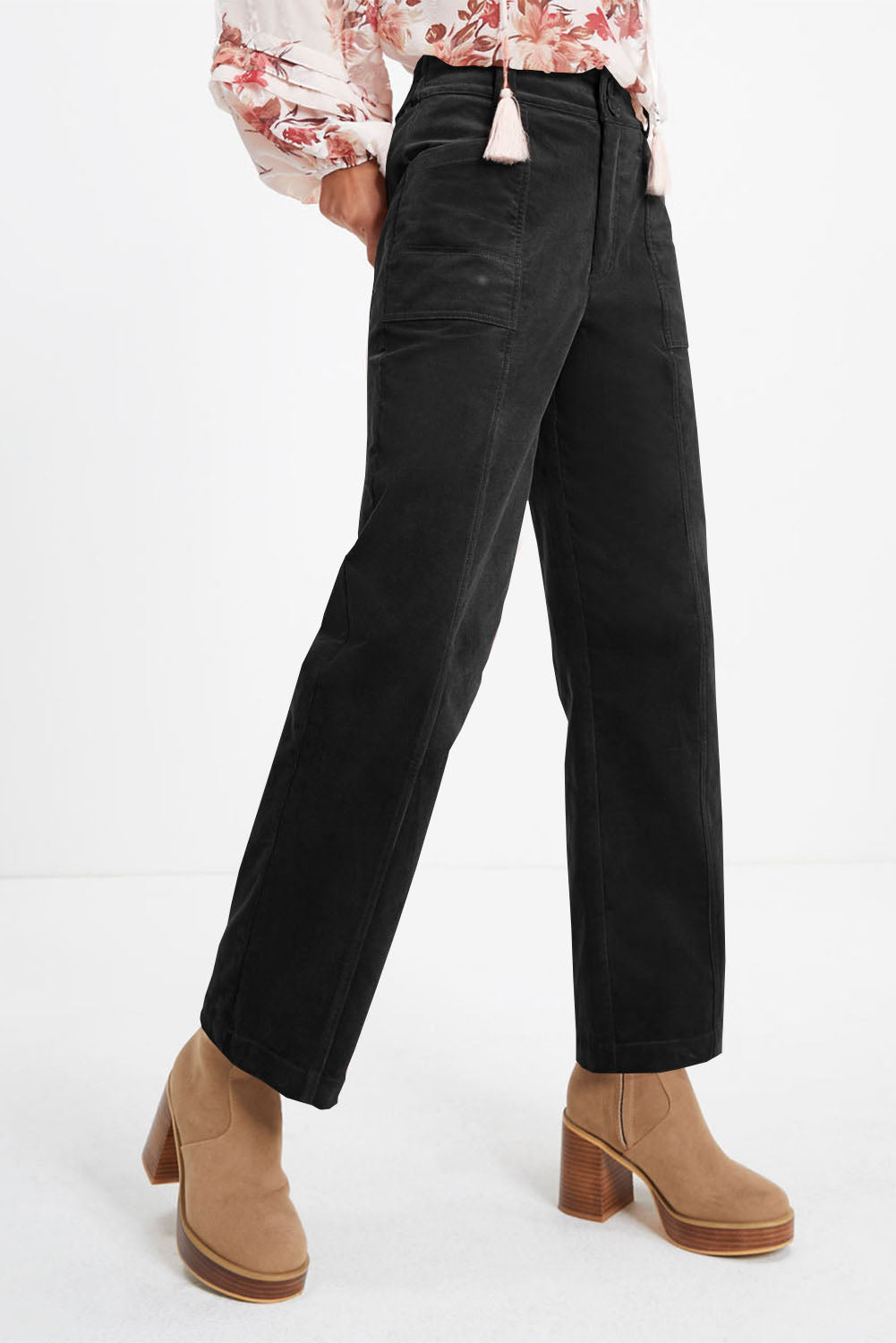 Black seamed front wide leg corduroy trousers with patch pockets.