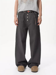 Relaxed wide-leg cargo pants in gray cotton with button fly and cargo pockets.