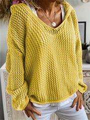 Yellow open-knit slouchy hooded sweater with a V-neck and long sleeves.