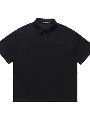 Black cotton blend polo shirt with buttoned placket and short sleeves.