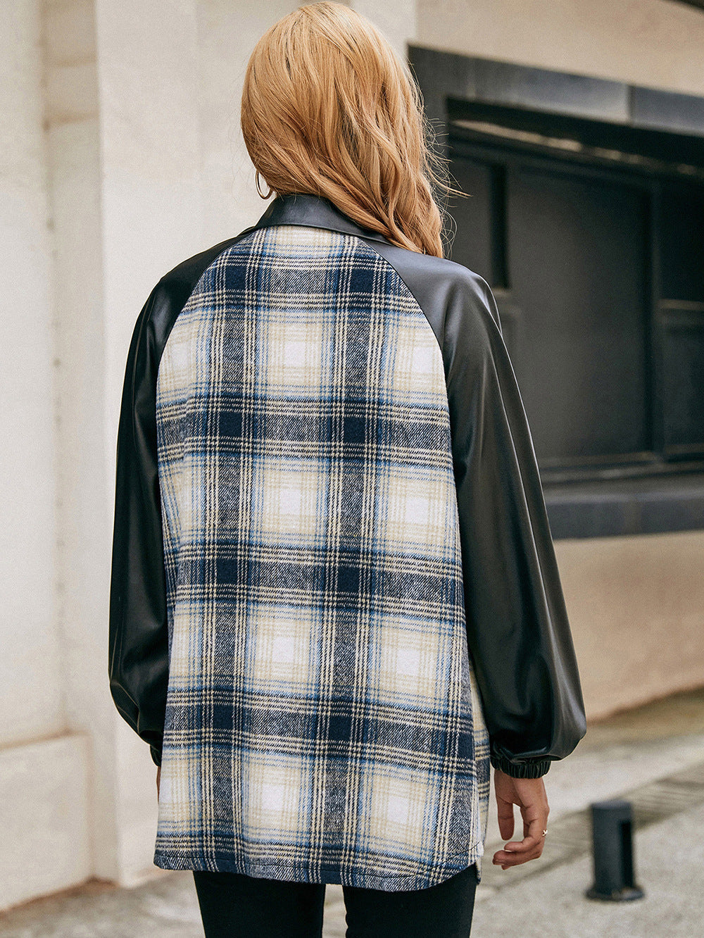 Plaid shacket with faux leather raglan sleeves in black and navy.