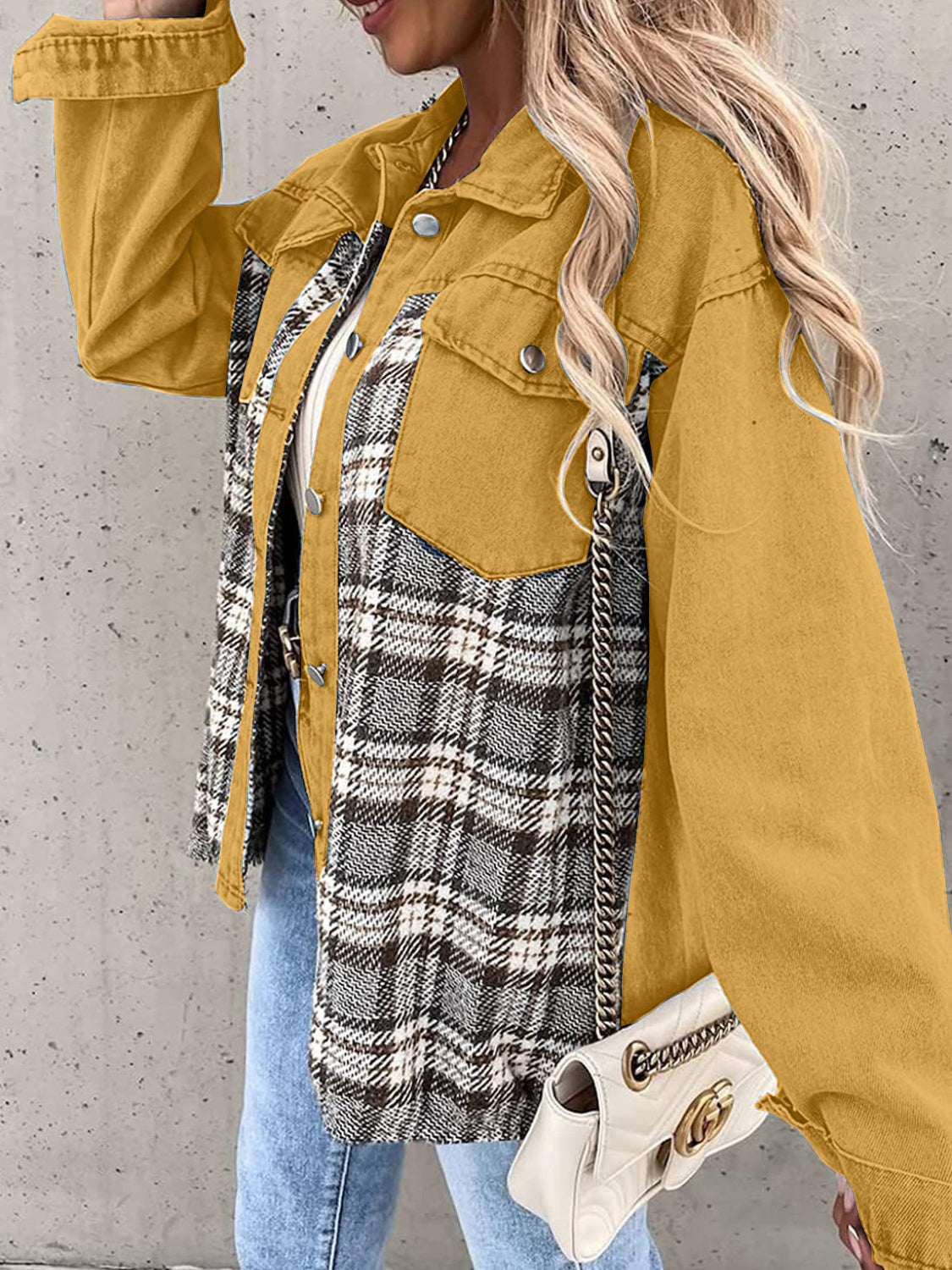 Panelled plaid denim hybrid jacket in mustard yellow with button details and a chain accent.